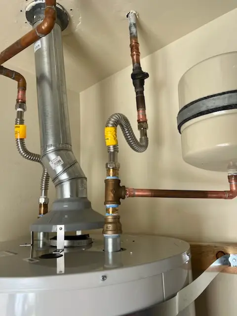 Water heater installation and plumbing repair in Overton Park